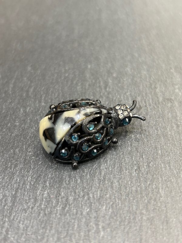 Broche COCCI Noire