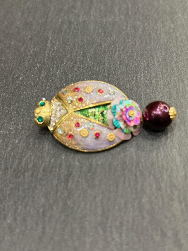 Broche COCCINELLA Mauve